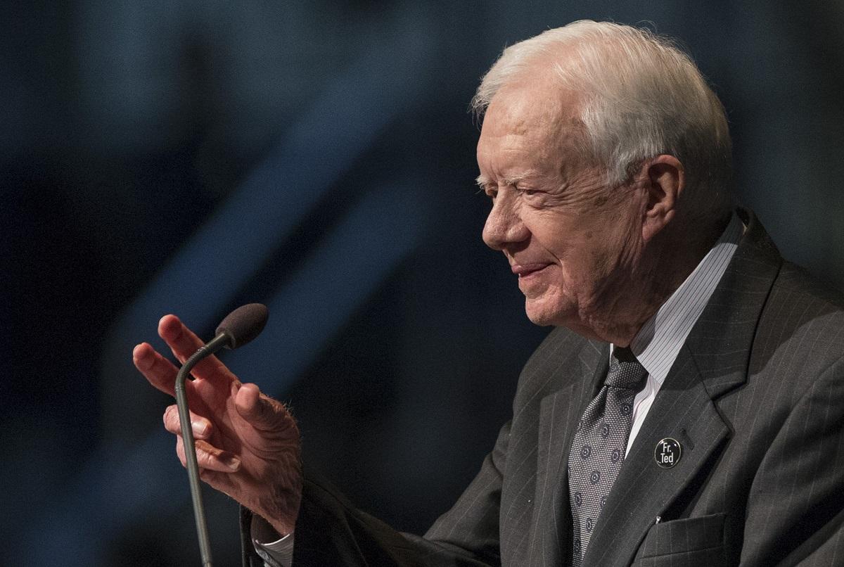Former President Jimmy Carter speaks during the memorial service for Rev. Theodore Hesburgh on Wednesday, March 4, 2015, inside the Purcell Pavilion at the University of Notre Dame in South Bend, Ind. (AP Photo/South Bend Tribune, Robert Franklin, Pool)