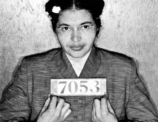 Rosa Parks arrested for refusing to give up her seat on a segregated bus, sparking the Montgomery Bus Boycott, 1955.